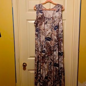 Beautiful floor length and bottom flair dress. Size 3x.